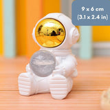 Astronaut Holding the Galaxy Table Lamp TheQuirkyQuest